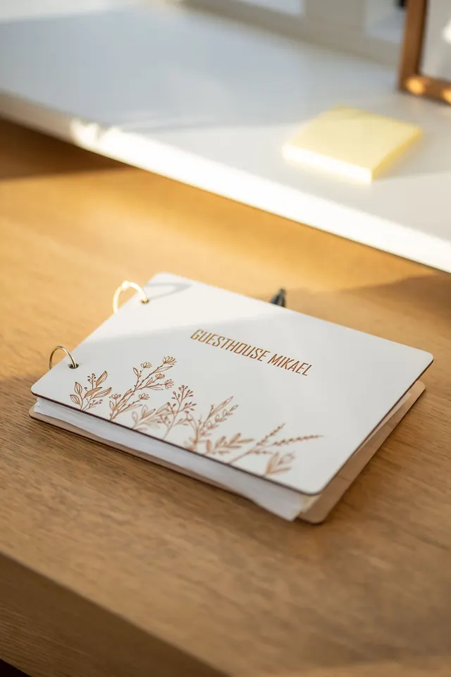 The guest book on the hall table