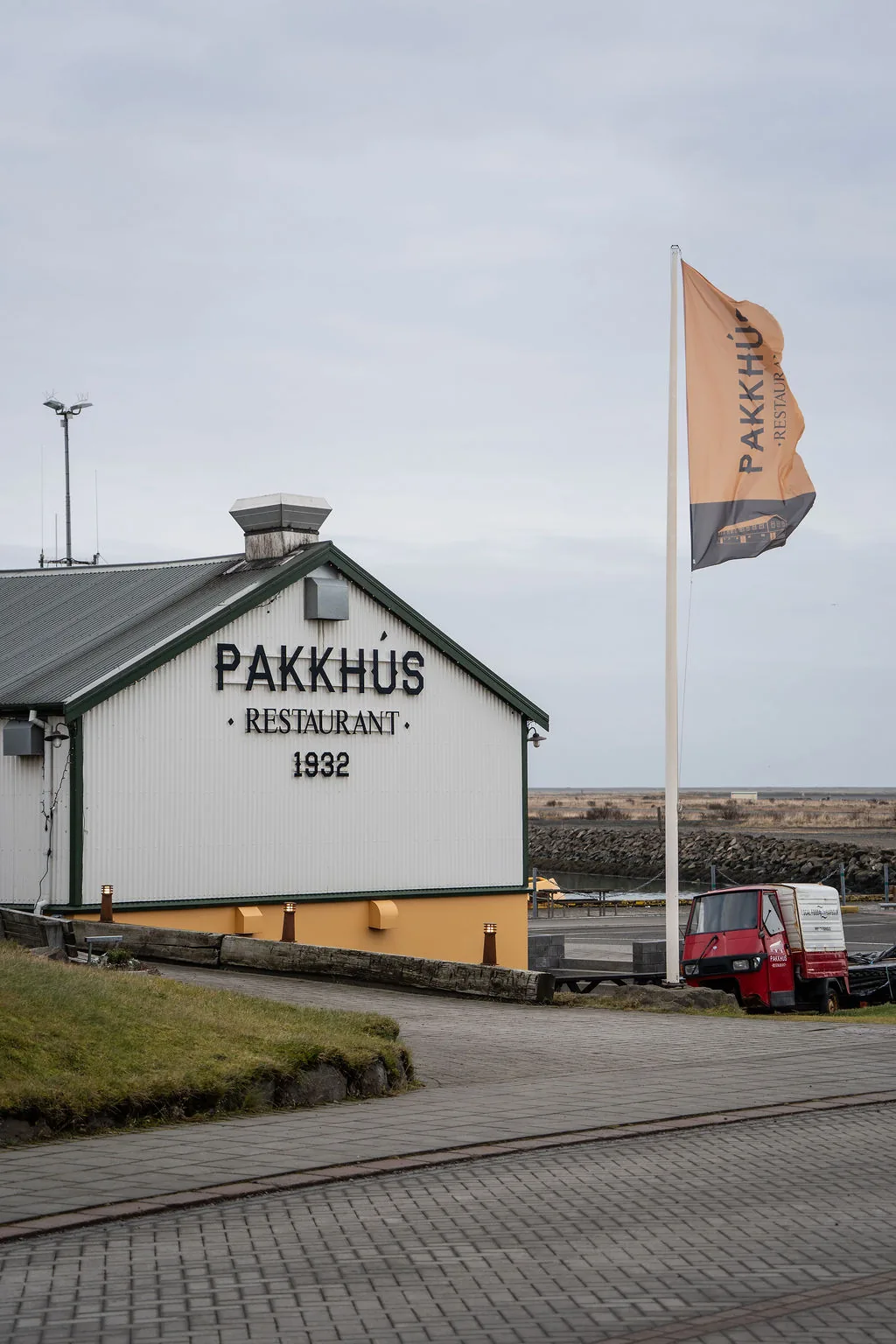 The Pakkhús restaurant building beside the harbour