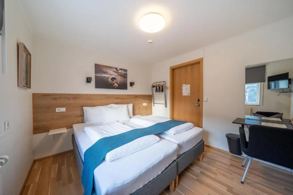 Double or Twin Room with a desk beside the window
