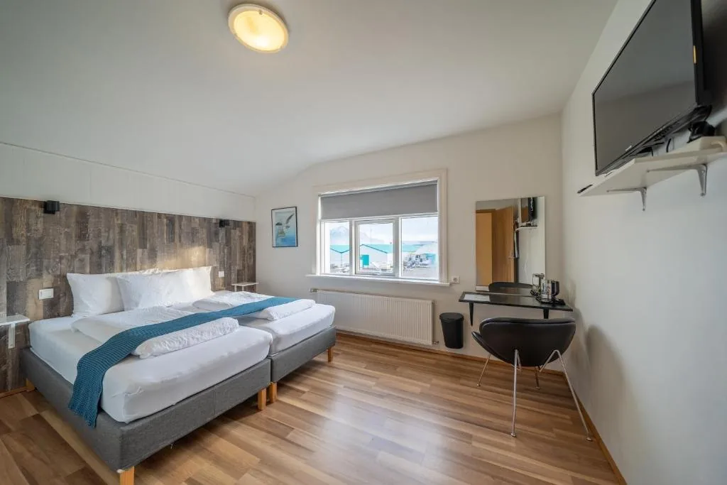 Double or Twin Room with a driftwood-toned wall panel
