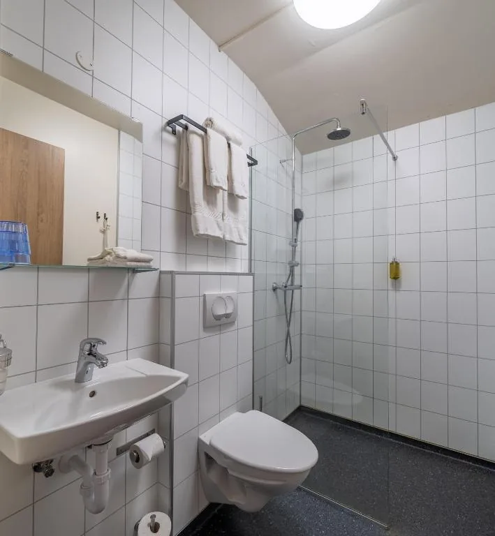 Private bathroom with a walk-in shower