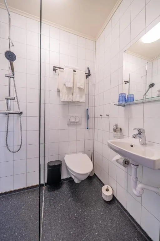 Private bathroom with a shower in the Economy Room